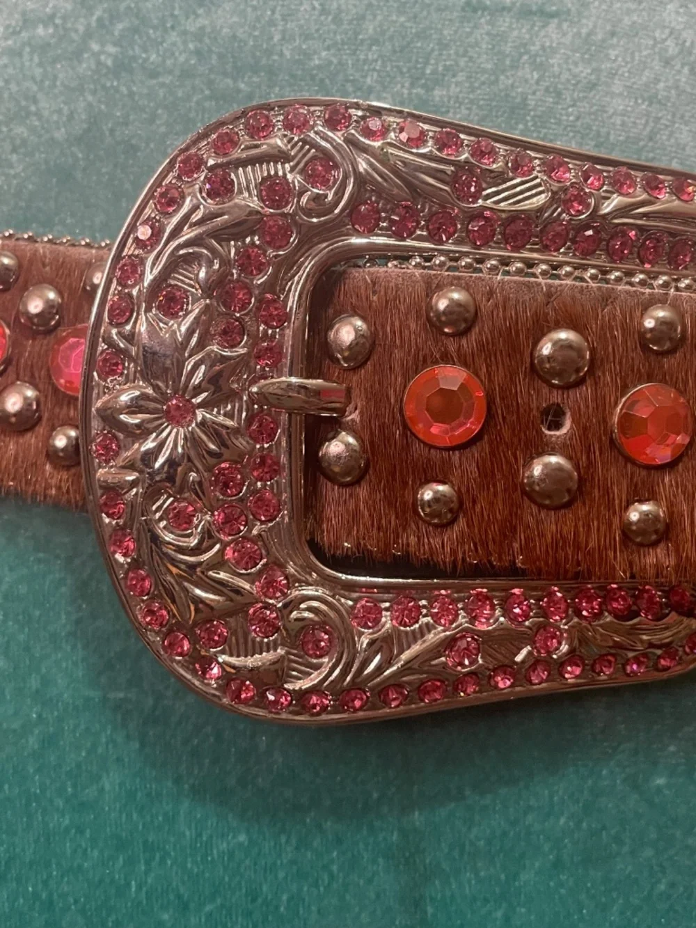 WB Atlas: Western-style belt featuring brown hair-on leather and pink crystals